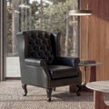 Chesterfield-Relaxsessel aus schwarzem Kunstleder